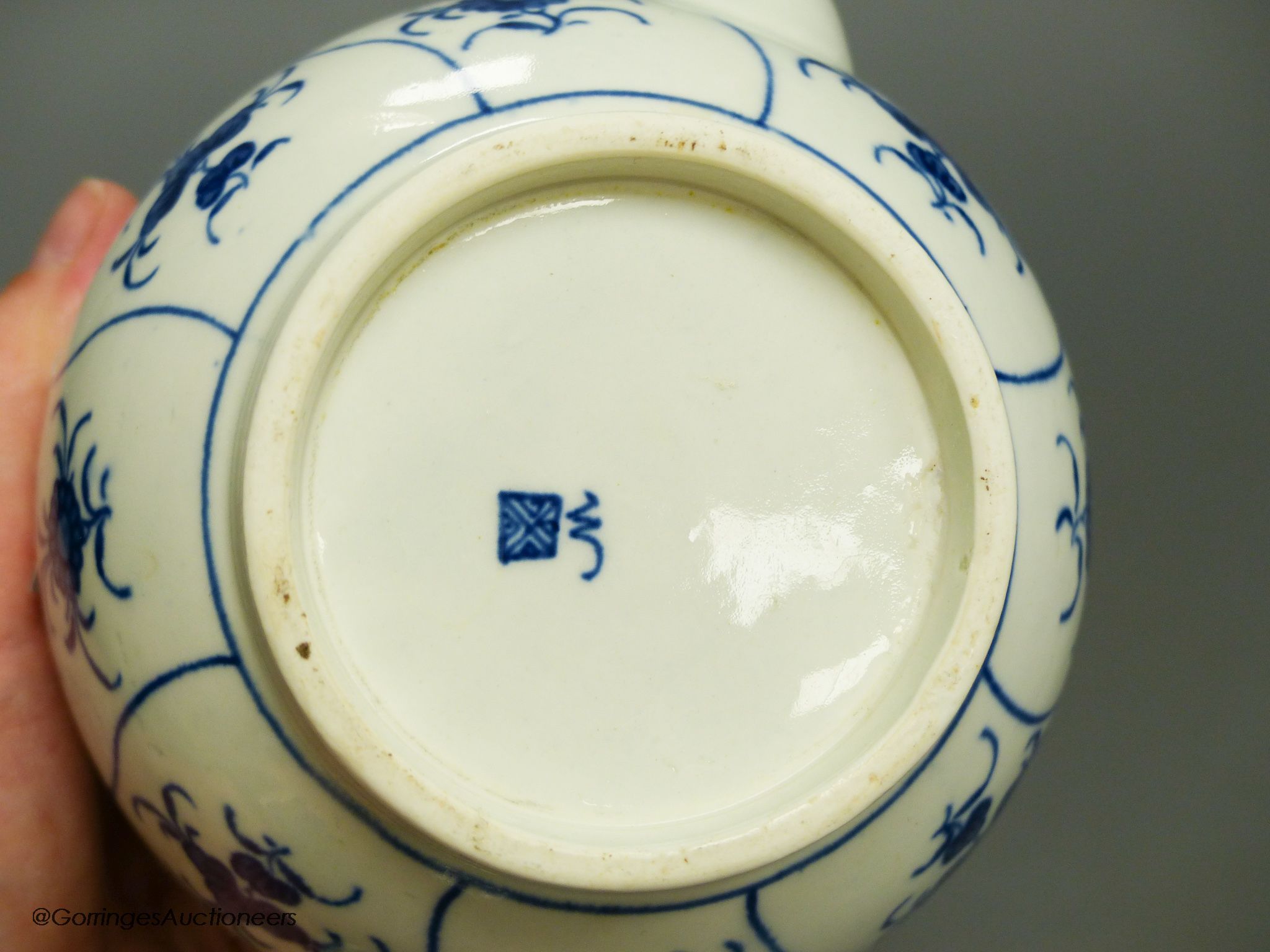 An 18th century Worcester blue and white teapot, height 14cm